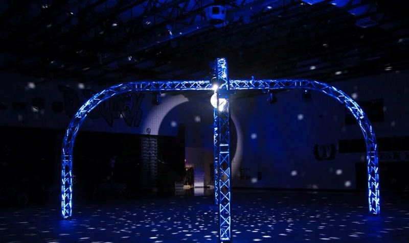 The Spyder is our most awe inspiring package we offer as its name suggests. The Spyder covers a medium sized area and has a static ceiling of between 13 to 16 feet of overhead lighting design. The Spyder Dome comes with a 25ft X 25ft “Spyder or Dome” shaped LED lit box truss suspended 13-16 ft (venue specific) over the dance floor.