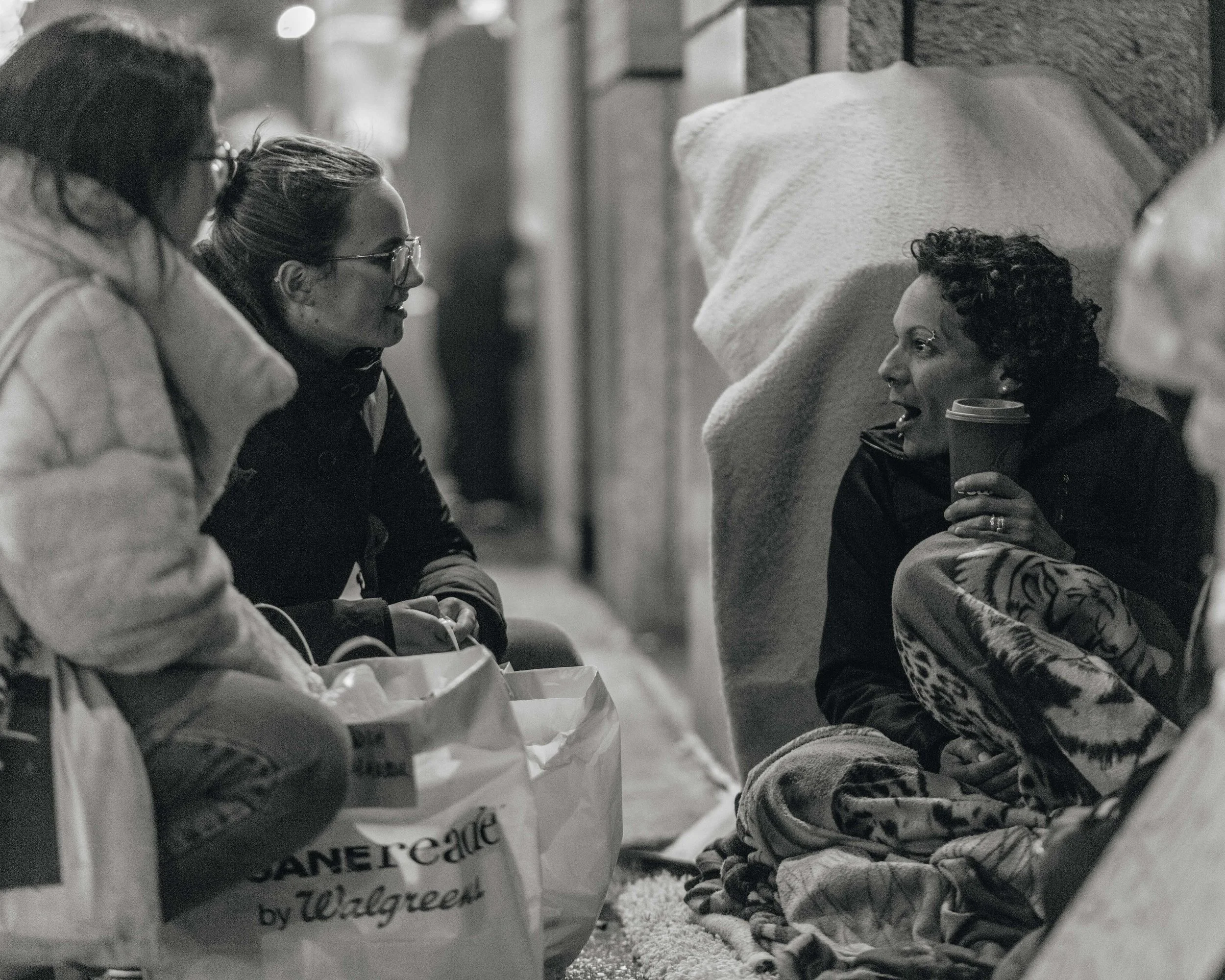 Union Square, NYC. For the most part, Hakook volunteers try to squat down and be on the same level as whoever they are talking and giving out donations to in order to create an equal dynamic between everyone.