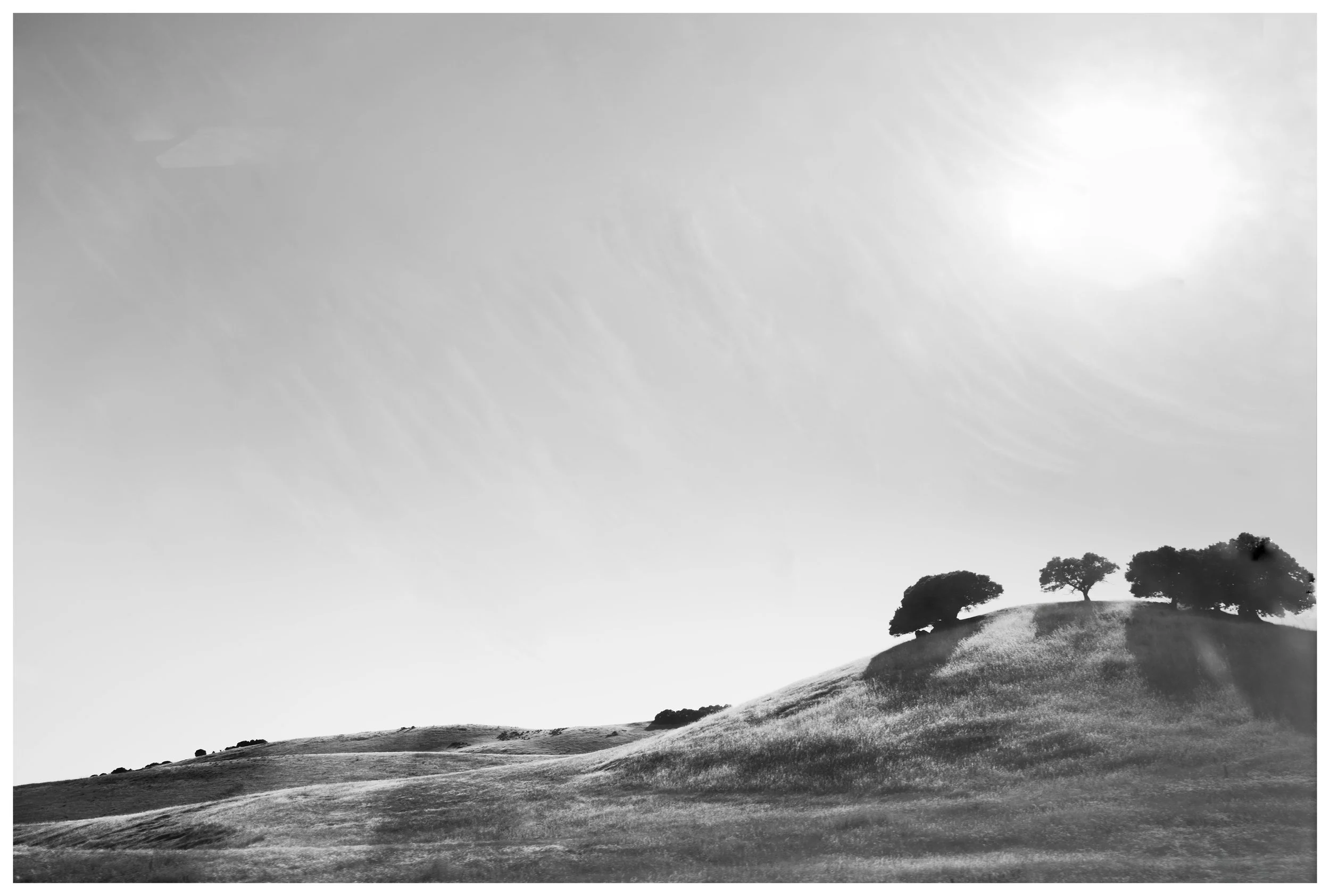 Ethereal Sky Over a Hillside