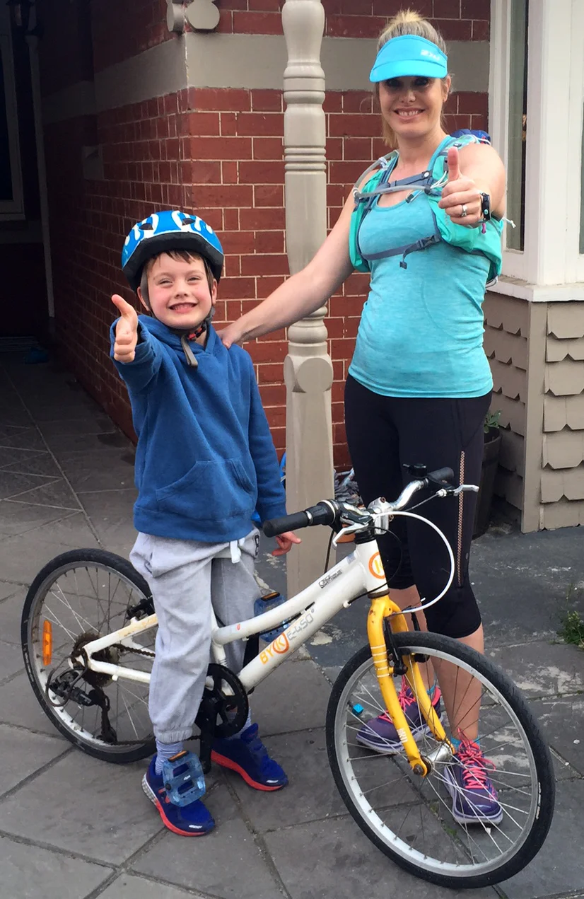 Katherine and her son preparing for a run/ bike ride. 