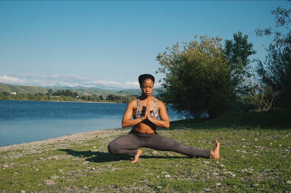 Sporty Yogi Girls Doing Fitness Exercises In Class, Sitting In Yoga Pose  Sukhasana (Easy Pose, Decent Pose, Pleasant Pose) With Palms In Anjali Mudra  Above Head Stock Photo, Picture and Royalty Free