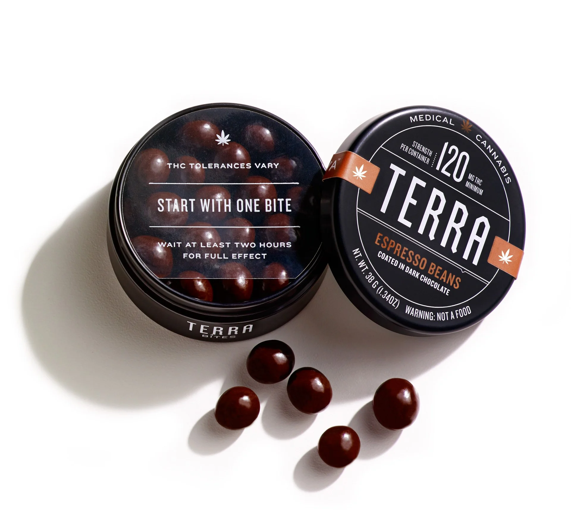 KIVA_Terra_Bites_120mg_Tin_White_Background__Open_Tin_with_Loose_Beans_Lo_res.jpg