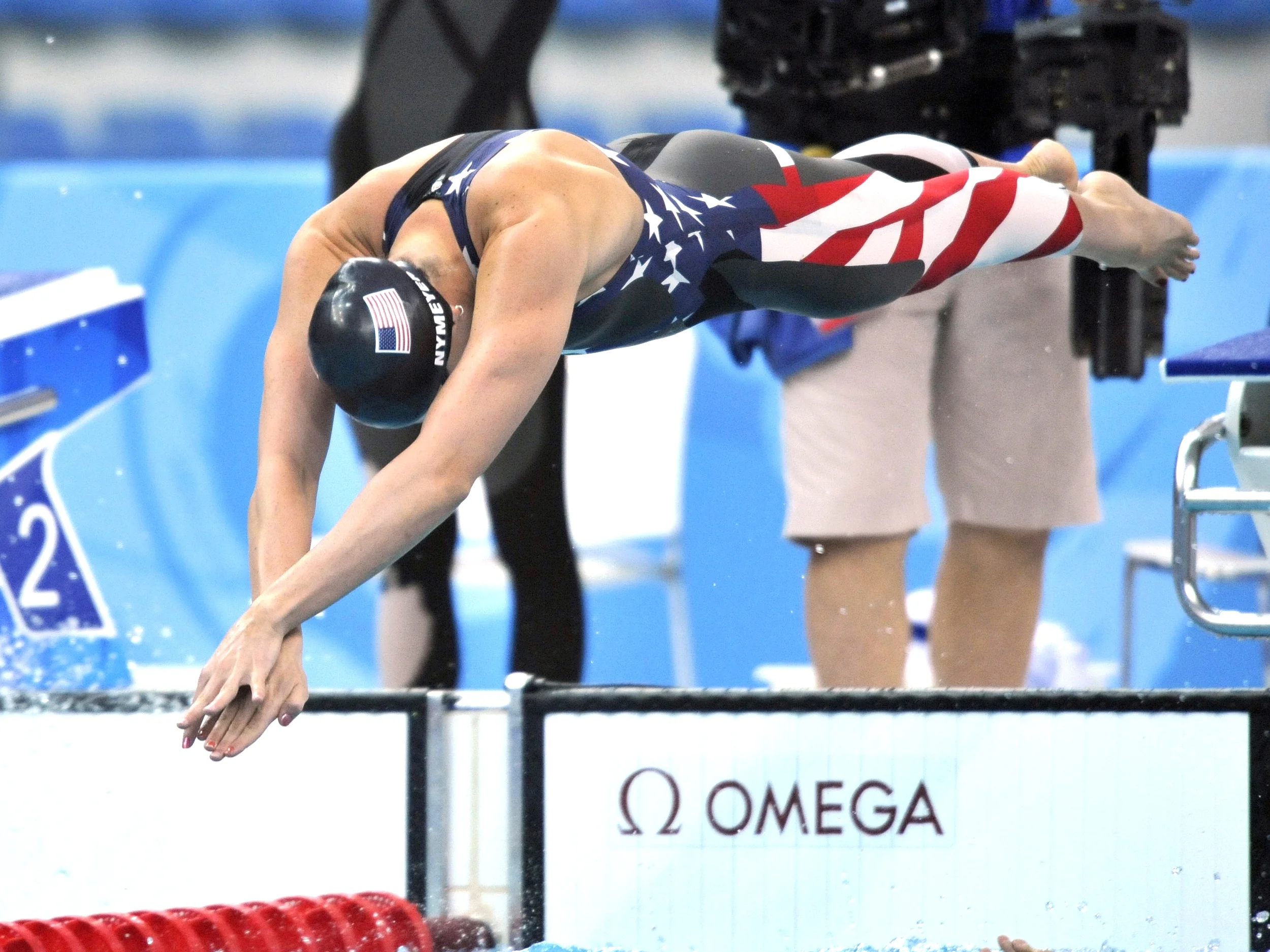 08-08 Lacey dives into olympic pool.jpg