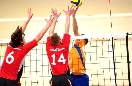 M Volleyball blocked shot.jpg
