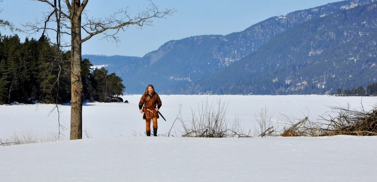 Hiking over frozen lake in buskerud