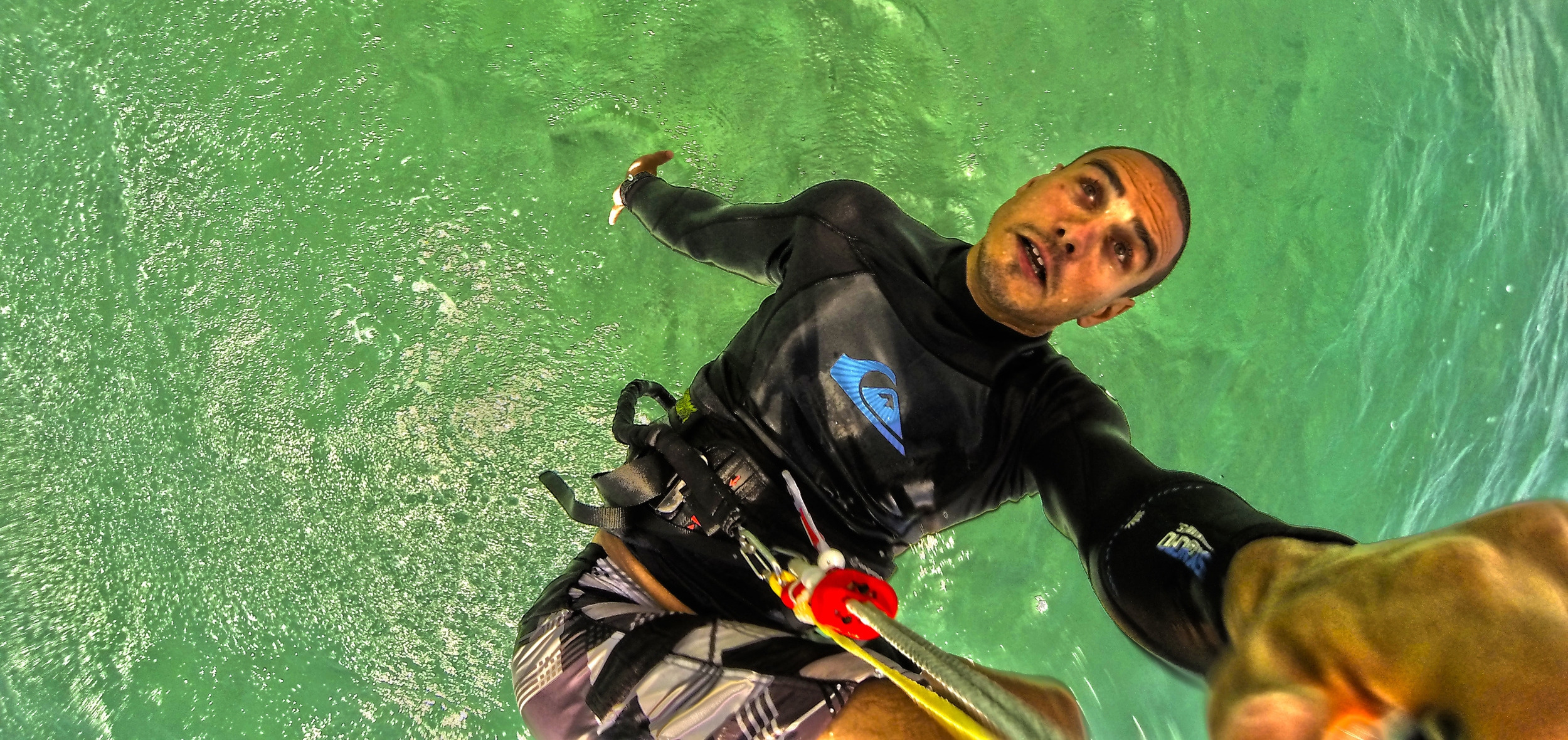 Gwen doing a backflip on his kitesurf in Kailua Bay, Hawaii.