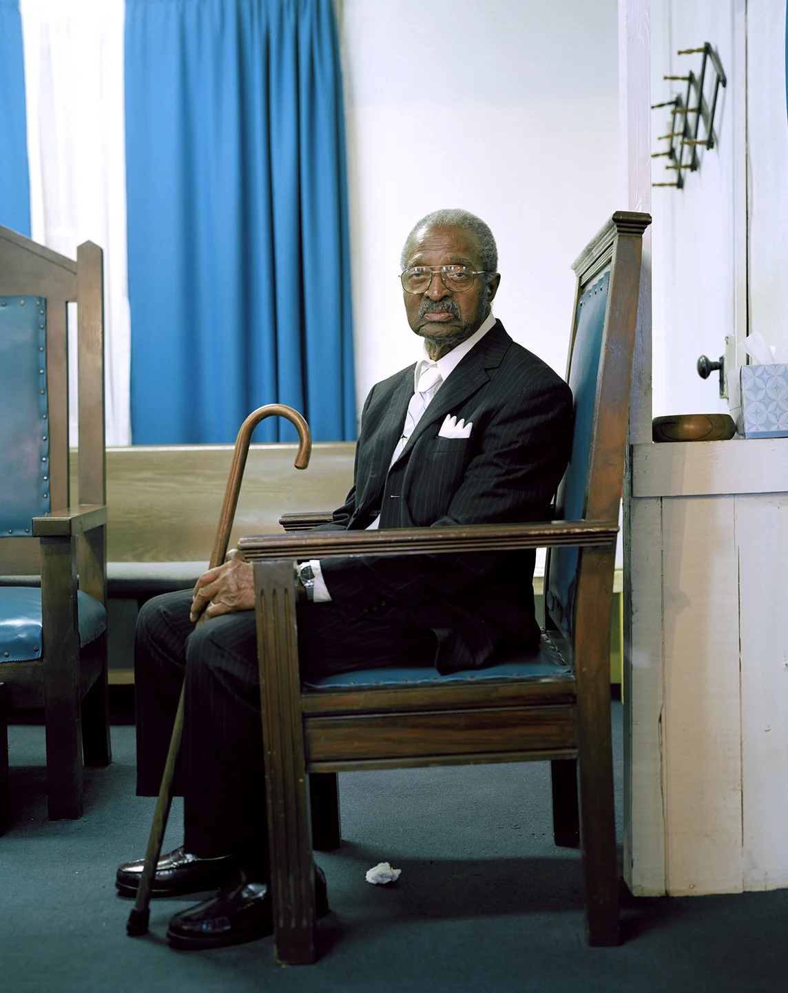 Elder Perry Sitting Inside Website.jpg