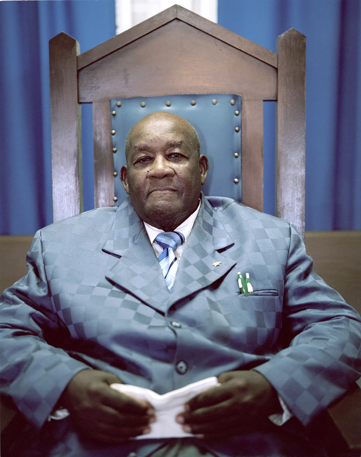 Elder Kennedy in Chair Upper Body Website.jpg