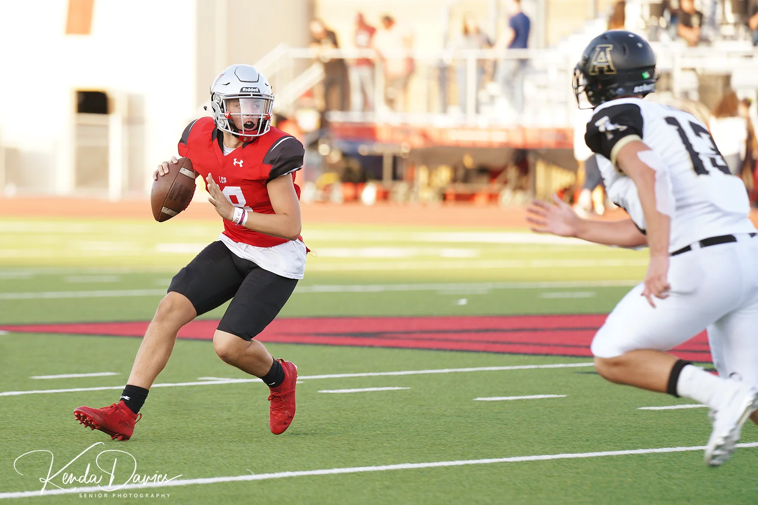 La Febre rolls out and looks for a receiver. La Febre was outstanding in his debut running in two TDS.