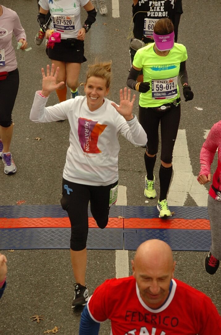Erin halfway through the New York City Marathon. 