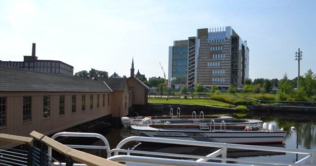 Swamp Locks gatehouse and new Lowell Justice Center under construction.