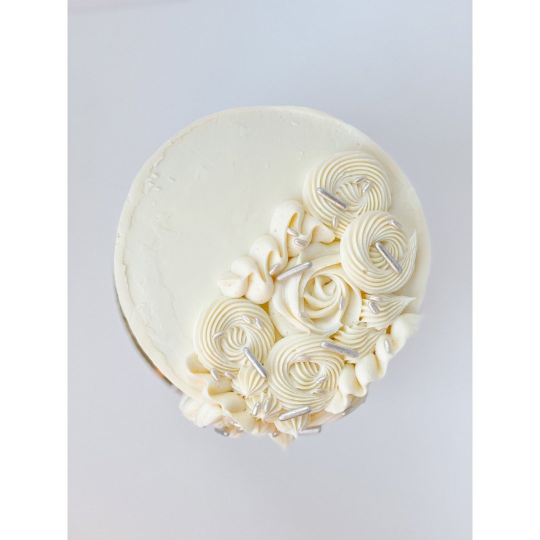 Cake #5 of 2024: Three layers of vanilla cake with white chocolate buttercream decorated with lots of sparkle ✨️ for a special wedding shower.⁠
.⁠
.⁠
.⁠
.⁠
.⁠
.⁠
.⁠
.⁠
.⁠
.⁠
.⁠
.⁠
#betsybakes #food52 #bakersofinstagram #cookie #instabake #foodblogfee