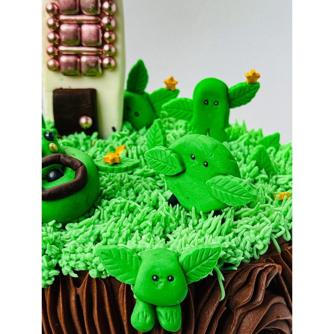 Cake #11 of 2026: My son knows comes up with wildly complicated ideas which are hard to execute...this goes for inventions and cakes. This year's birthday cake was to have a giant tree with branches hanging over a small city with lots of plant people