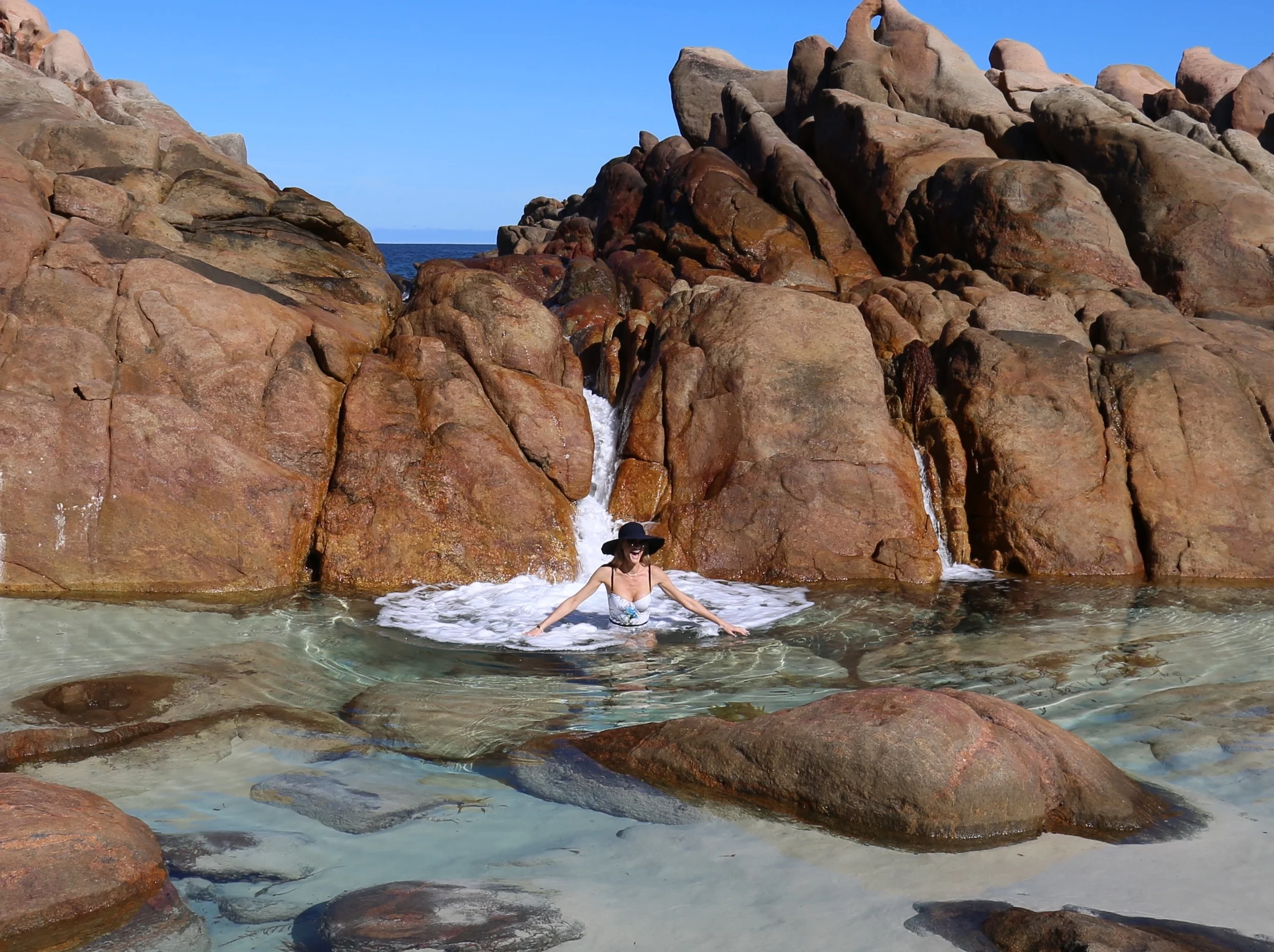 Swimsuit: Ted Baker Hat: Seafolly