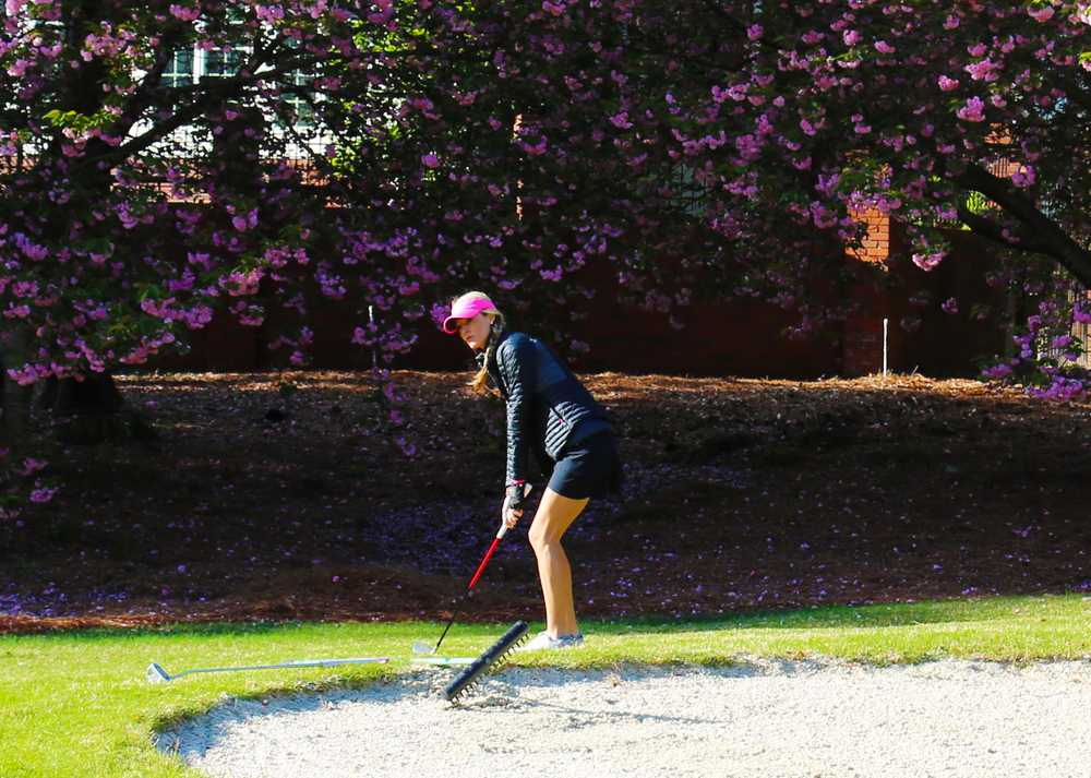   Clubs: Custom made Nike,&nbsp;Windbreaker: Nike, Skirt: Nike, Shoes: Nike, Hat: Nike   