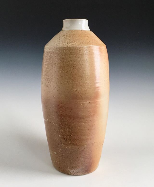 Wood fired bottle vase, nineteen inches tall with a slight flash.
#woodfiredceramics #woodfired #bottle #vase #stoneware #clay #ceramics #ceramicarts #pottery