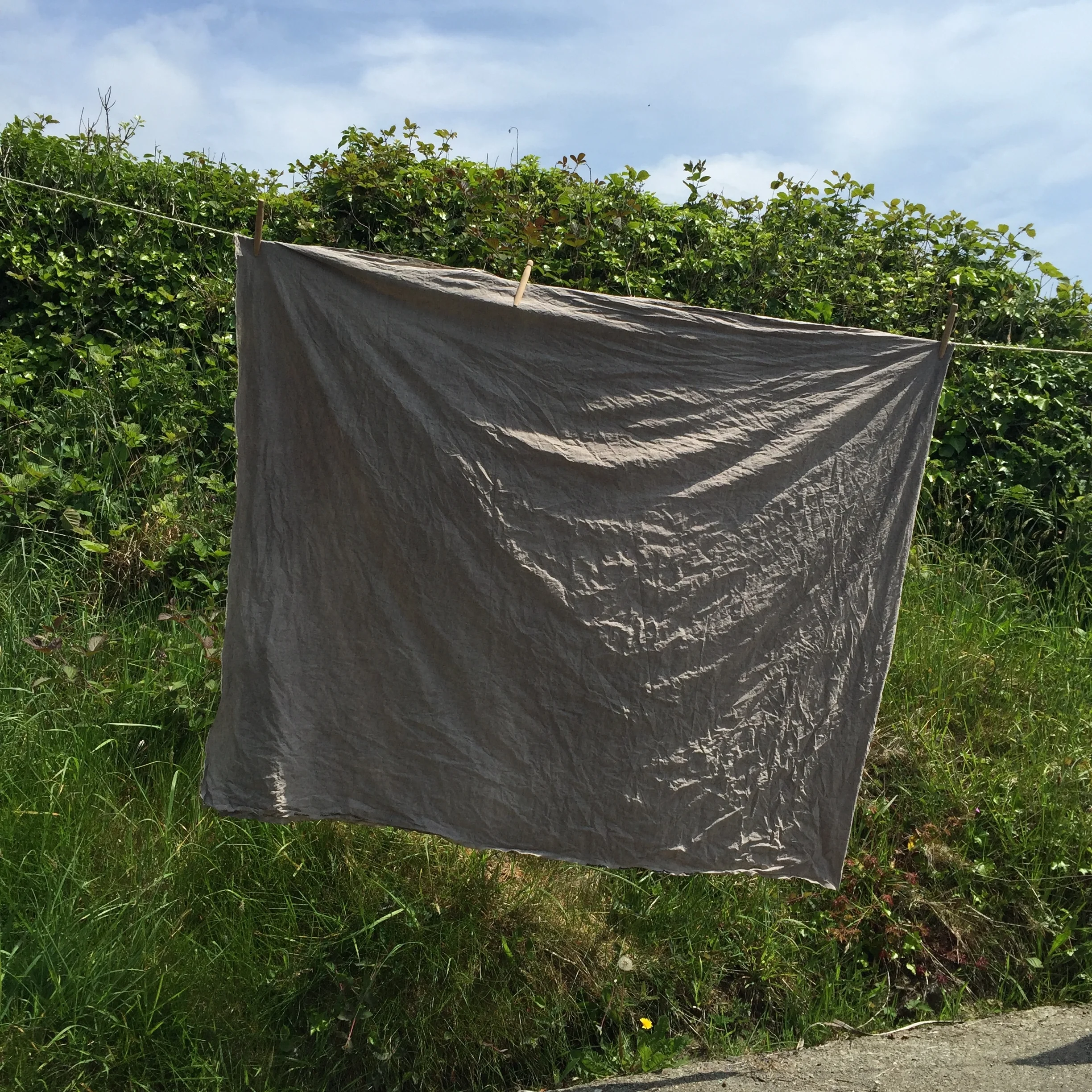 Line drying organic cotton prior to making up.