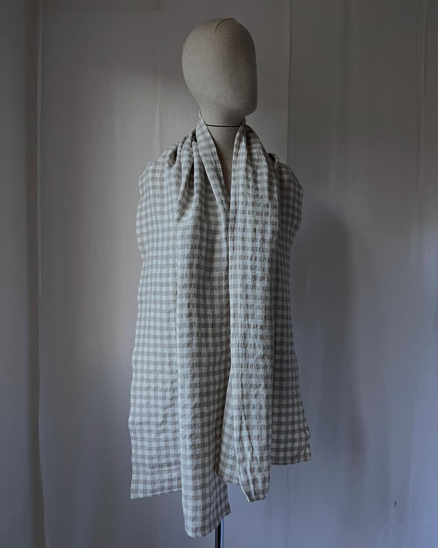 Gingham scarf made of Irish linen woven in Wexford by Emblem Weavers. An Irish linen gingham in shades of natural and beach. The hem is sewn by hand (that&rsquo;s about 5 metres of hand sewing).
.
.
.
#irishlinen #artisanmade #longscarf #linenscarf #