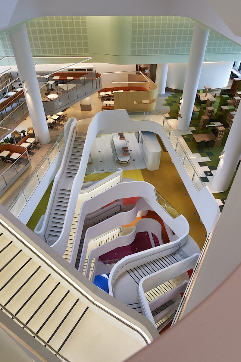 when-designing-the-structure-hassell-focused-on-bright-colors-curved-stairways-and-creating-a-positive-work-environment.jpg