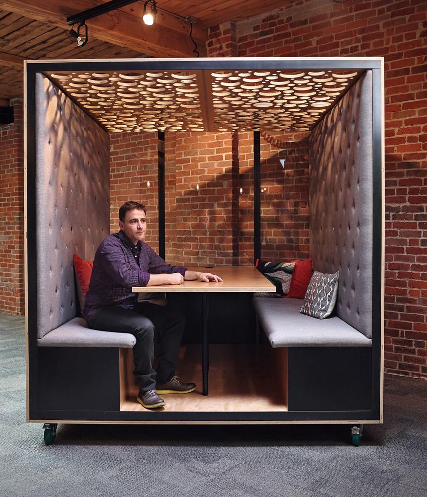 ROLL WITH IT | Butterfield in Slack’s Vancouver office; the custom seating was designed by Leckie Studio and Slack’s head of design, Brandon Velestuk.