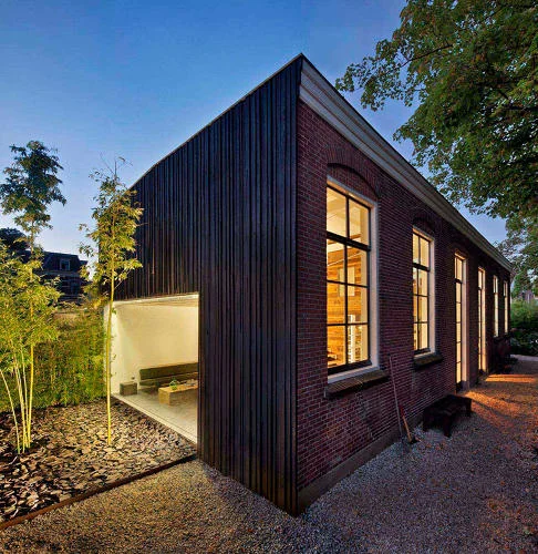 This Stunning House Was Made Entirely From The Remains Of A Demolished Office Building