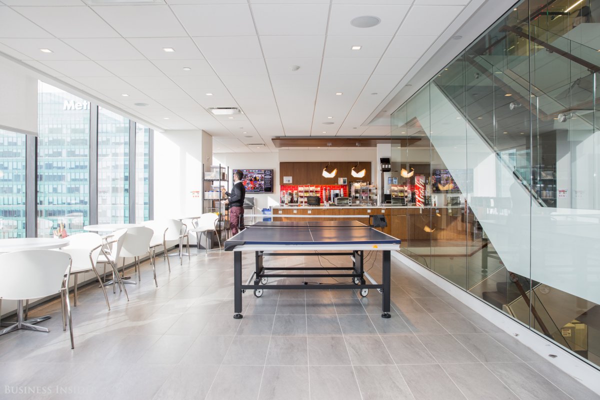 on-the-43rd-floor-just-beside-the-lobby-is-the-offices-main-communal-space-it-contains-the-kitchen-ping-pong-table-and-a-host-of-cafe-and-diner-style-tables-for-bainies-to-work.jpg