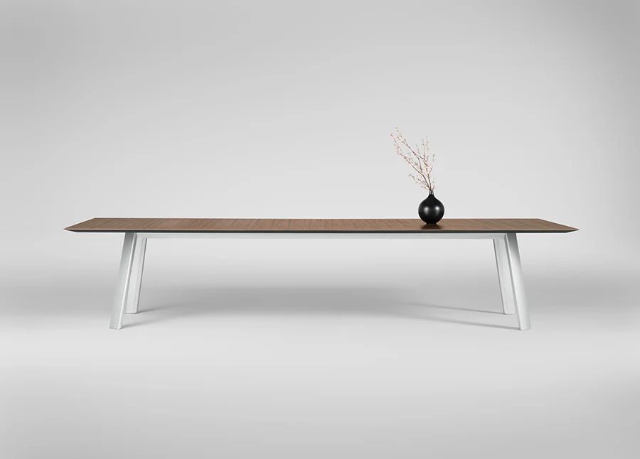 The Traverse table, designed by Rainlight and manufactured by Okamura. While up to 20 feet long, its tabletop is less than 1.25 inches at its thickest point. Courtesy Rainlight