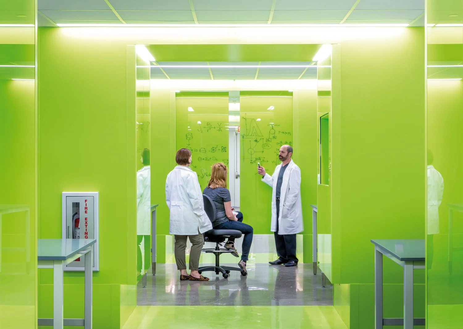 Rice University’s New Emerging Science & Technology (NEST) Center includes collaboration portals located across its floorplan designed for spontaneous interaction and defined by bright green, writeable glass panels