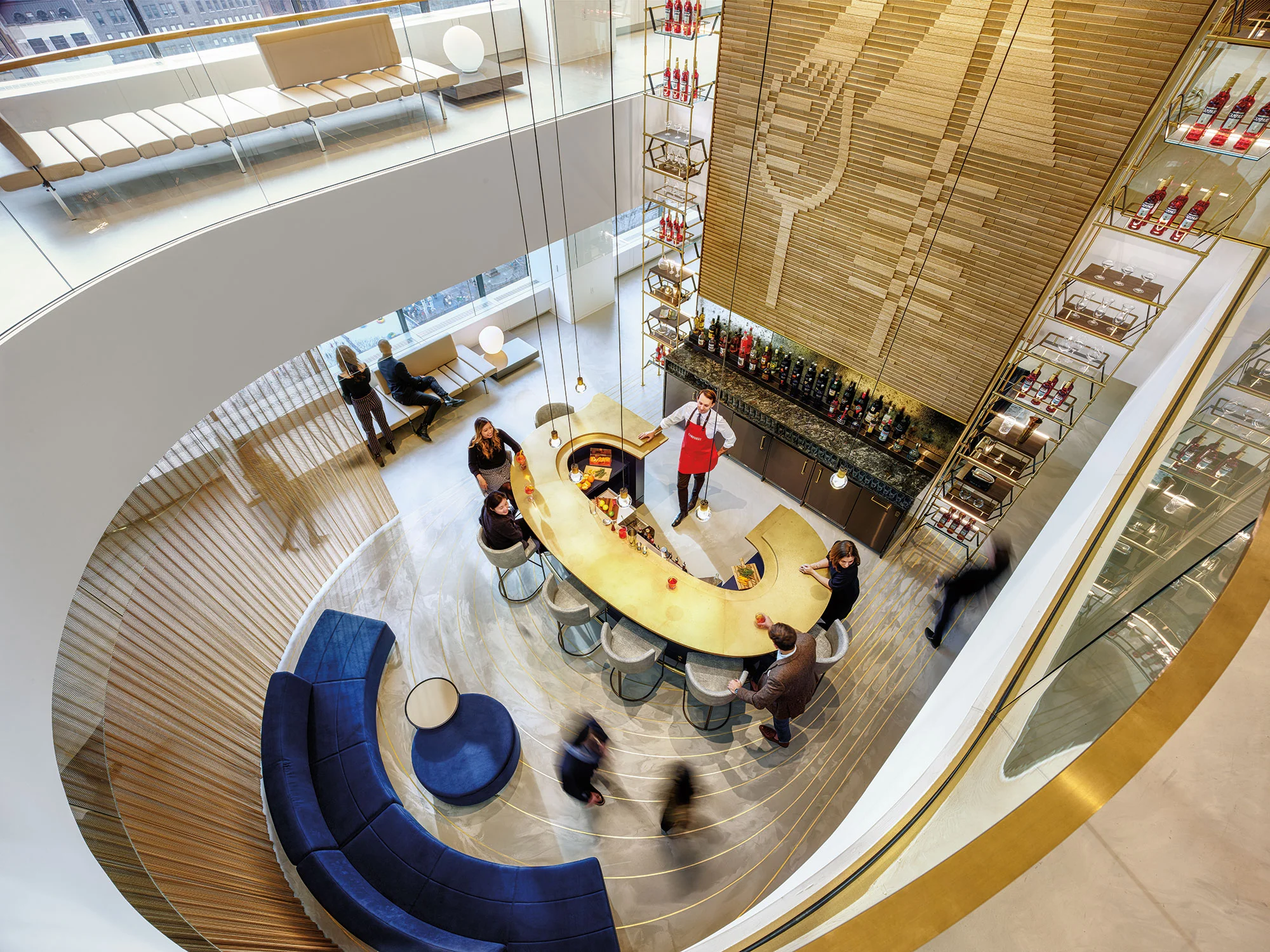 Campari North American headquarters, New York. Four distinct bar-like experiences immerse guests and staff in the Campari culture while offering people a place to work away from their desks.
