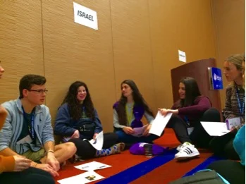 Teens discussing the importance of having political discussion without dividing our community.