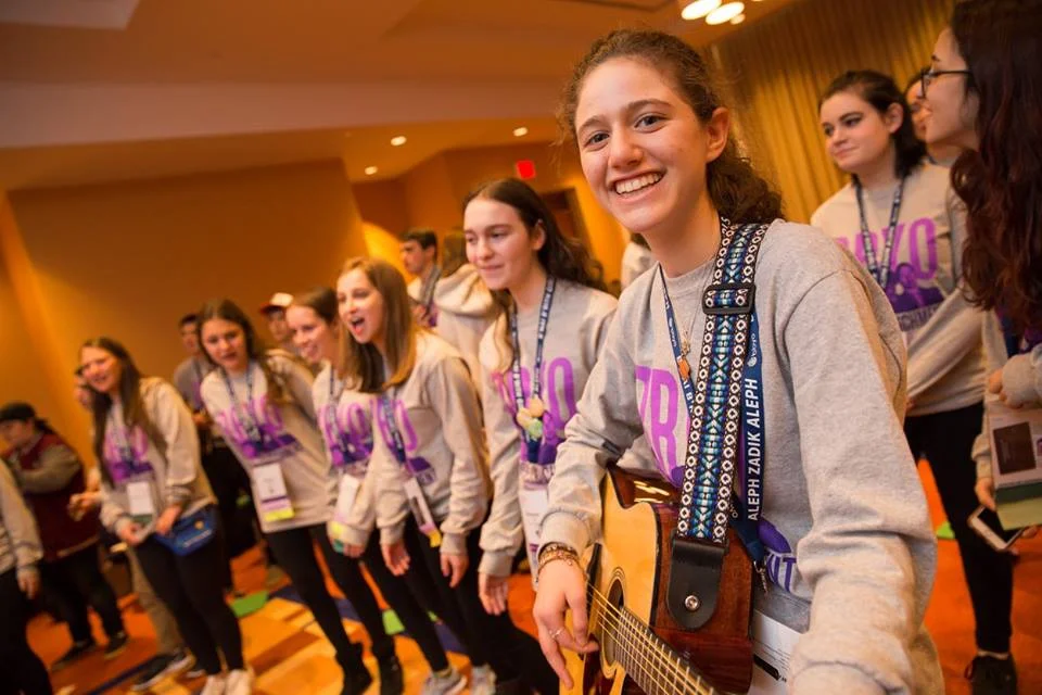 B'nai B'rith Girl teen song leader enjoying programs with friends. Photo by Mike Kandel Photography.