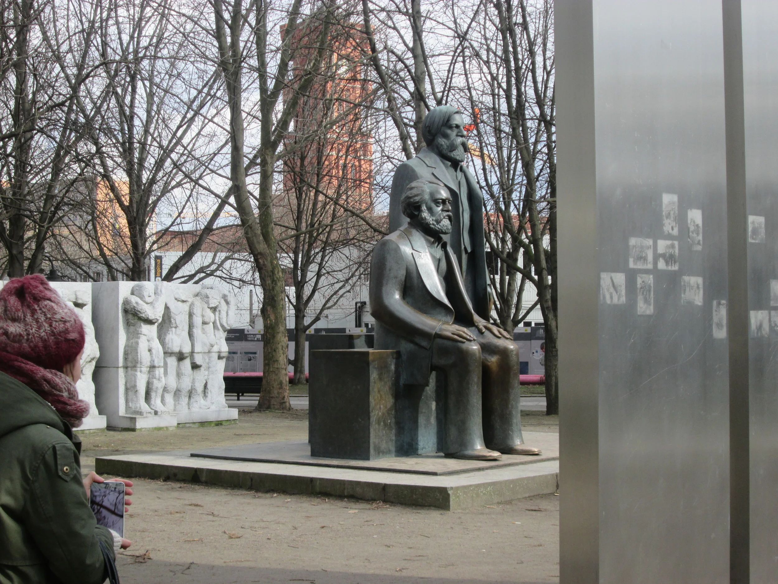 Statues of Karl Marx (seated) and Friedrich Engels (standing) in the Marx-Engels-Forum in former East Berlin
