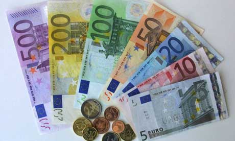 Bills and coins of the euro currency