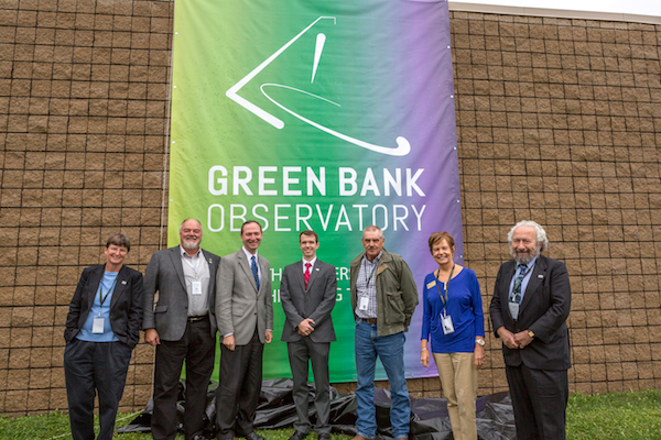 New Green Bank Observatory logo with (from left to right) Karen O'Neil, GBO director; Mike Holstine, GBO Business Manager; J. T. Jurkowski, Legislative Assistant for Senator Capito (R-WV); Geoff Hempelmann, Legislative Assistant for Congressman Jenkins (R-WV); Dave McLaughlin, Pocahontas County Commissioner; Peggy Hawse, Regional Coordinator for Senator Manchin (D-WV); Ethan Schrier, President and CEP of Associated Universities, Inc. mage owned by Green Bank Observatory.