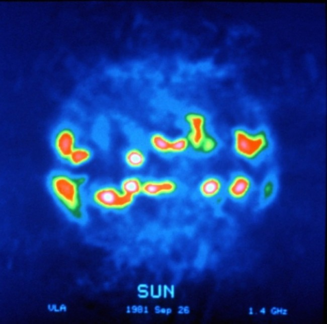 Radio image of the Sun recorded by the VLA in 1981. The brightest regions are part of the corona but beyond sunspots. (NRAO/AUI, retrieved from PrimaLuceLab )