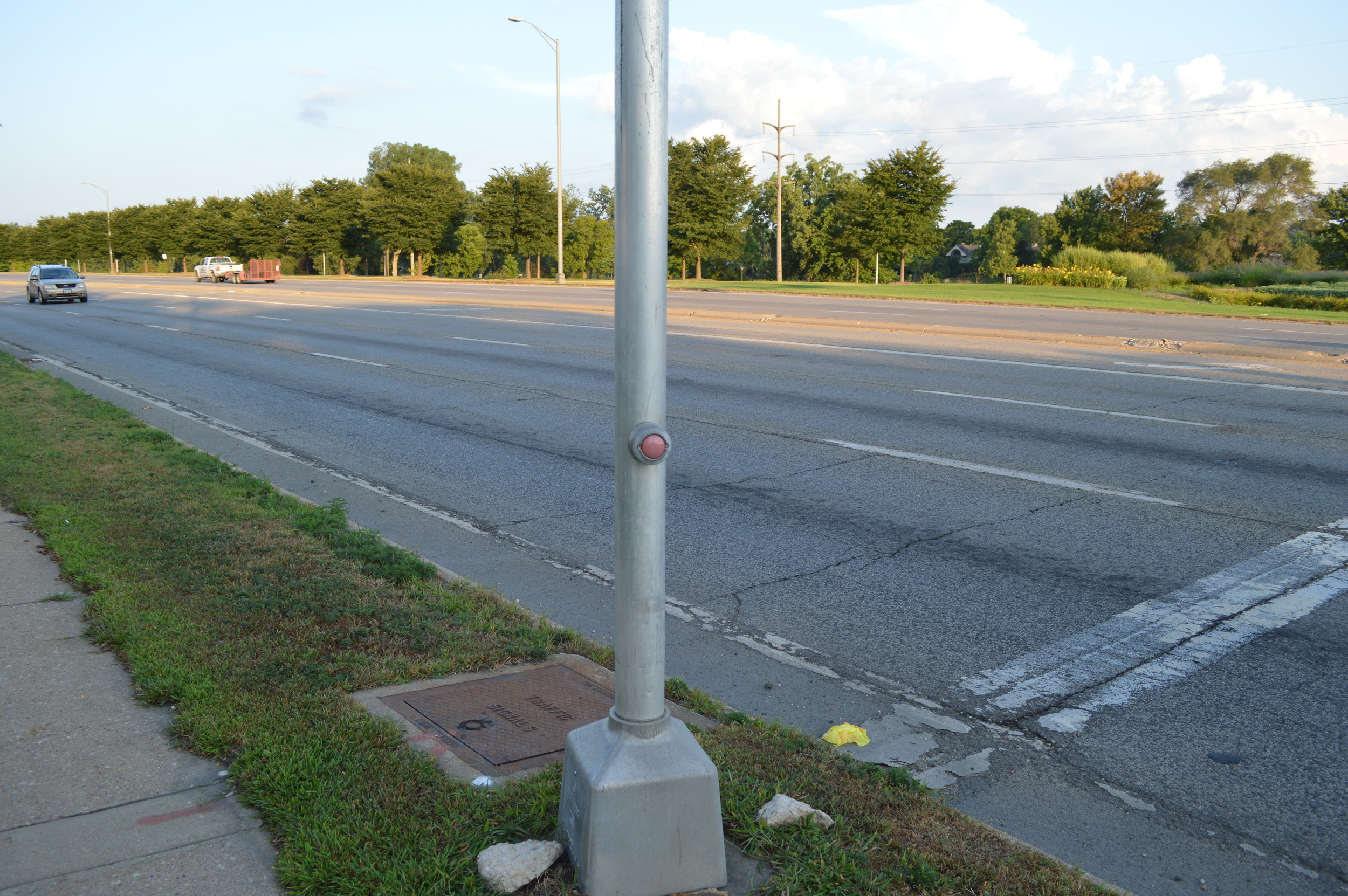 Southeast corner of Ethel Ave. and 251 intersection, an unassuming crosswalk button capable of stopping 6 lanes of commuter traffic.