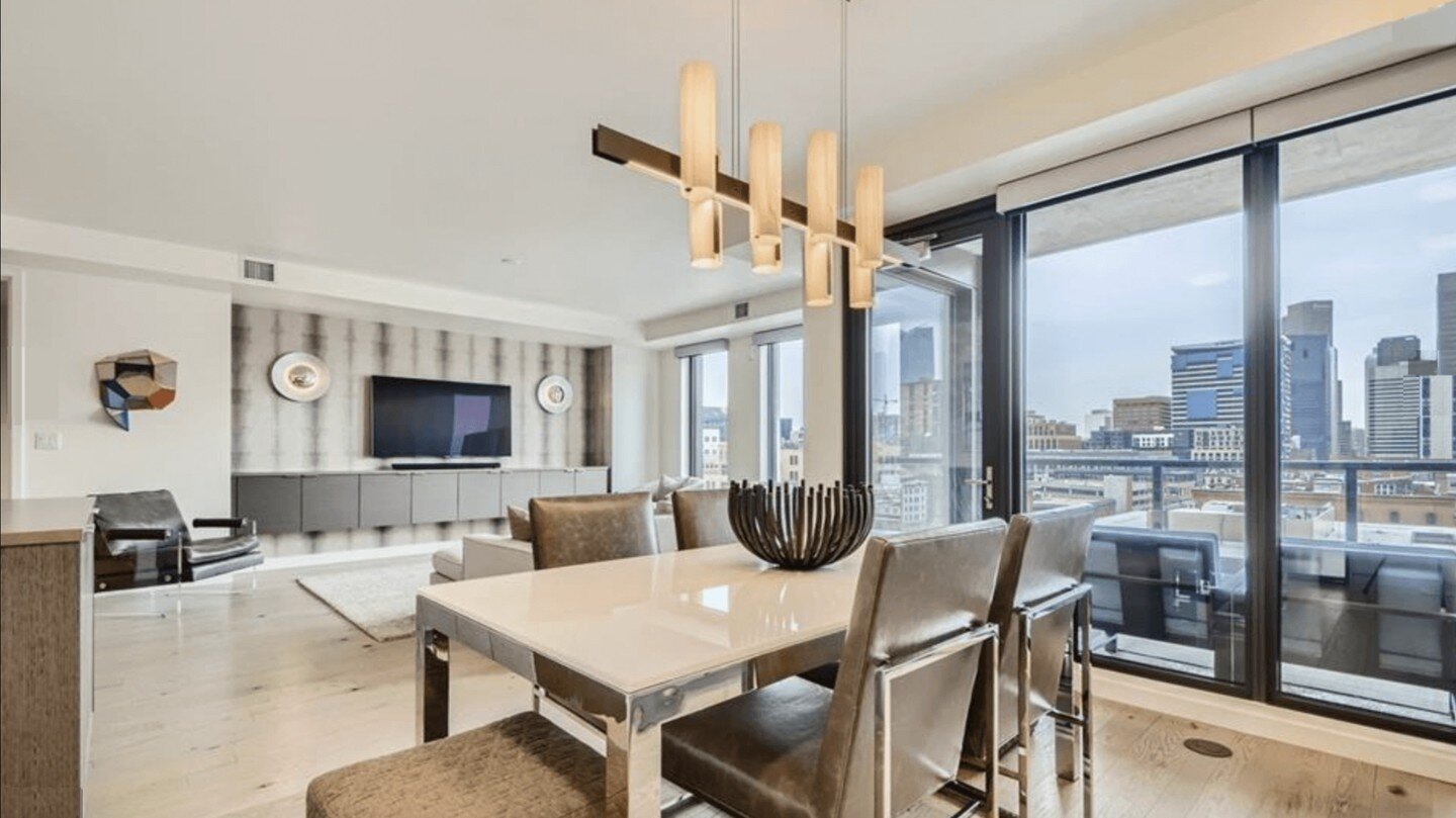 Views of Union Station add a layer to the urban feel of this 10th floor condo at The Coloradan. @innovationsusa @lzflamps @the_coloradan . #denverdesigner #coloradointeriors