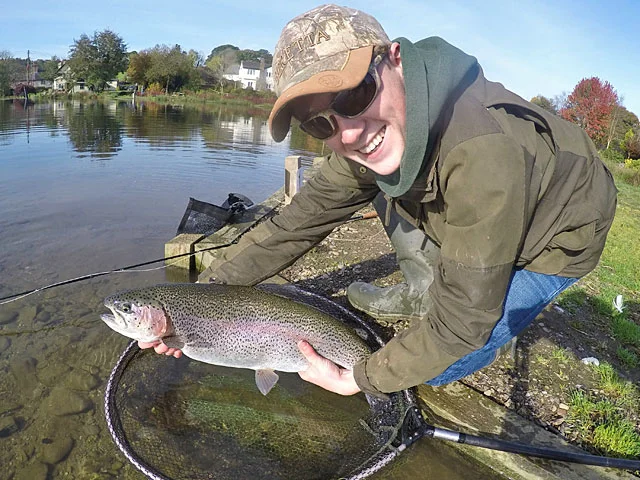 The smile says it all - Toby with his stunning double figure Rainbow