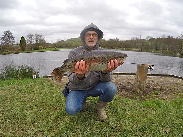 Peter Bridges with his wining Troutmasters fish of 8lb 1oz caught on a Black Snake Fly