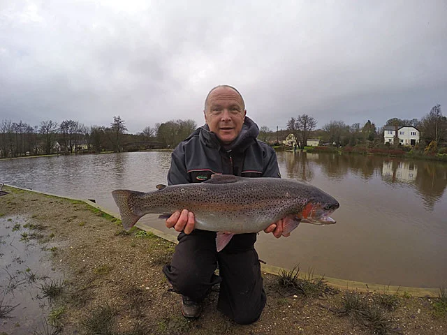 John Clarke with a fin perfect 8lb January Rainbow Trout from Anchor Lake