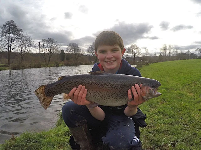 Star young angler - 12 year old Ben Taylor was thrilled with his 6lb 8oz Rainbow caught on a Buzzer