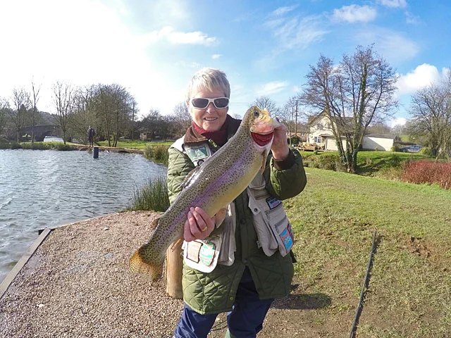 Mary Ratcliffe with the best Trout of the match - a beautifully marked Rainbow weighing 4lb 12oz