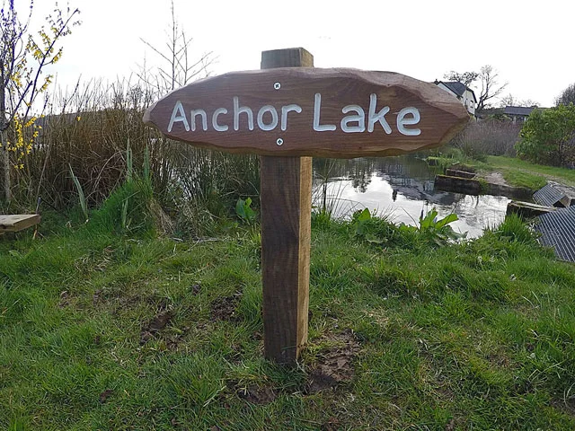 Anchor lake fitted out with its new wooden sign 