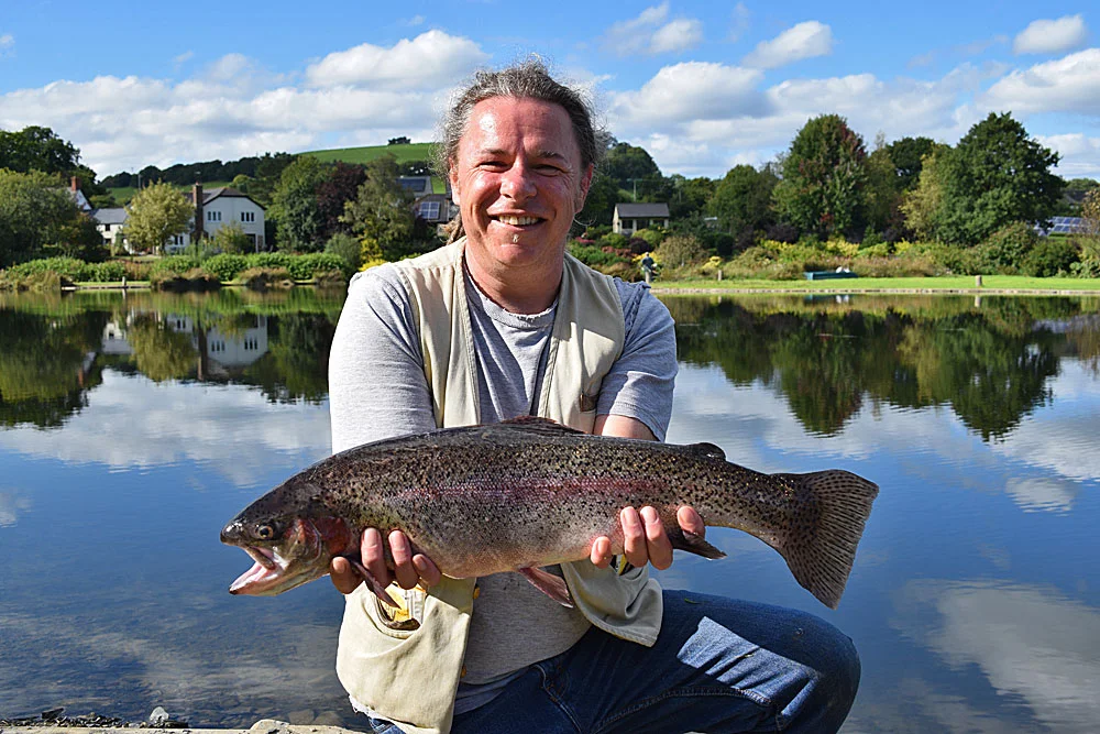 Shaun Rowden with the 6lb 4oz Rainbow he stalked during a beautiful day on Anchor Lake