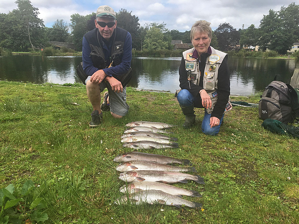 Keith & Mary with their fish - 100 times better than last year they say!