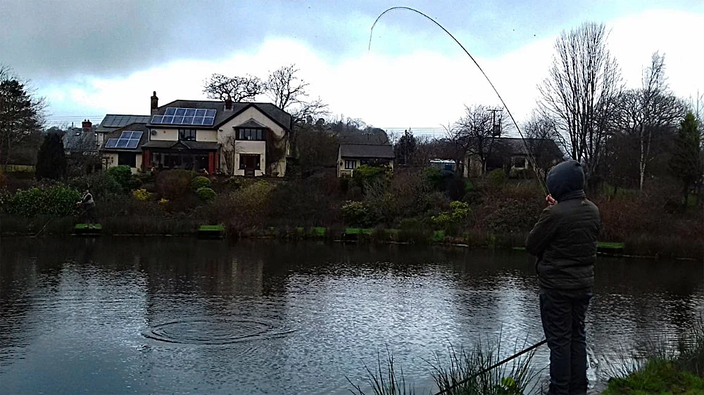 Ben Cheeld playing another Rainbow Trout on Anchor Lake……….
