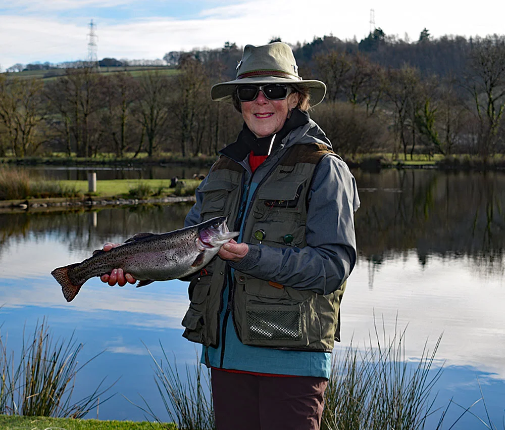 Jane Young enjoying a beautiful winters day fishing on Anchor Lake