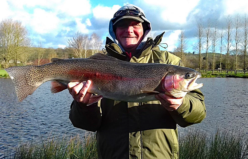 Andy Dade with his personal best 12lb 2oz Rainbow Trout