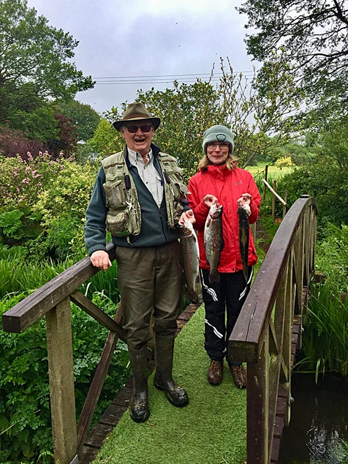 John Dawson who organised the succesfull FORCE event at Exe Valley with Jackie and just a few of the fish from the day.