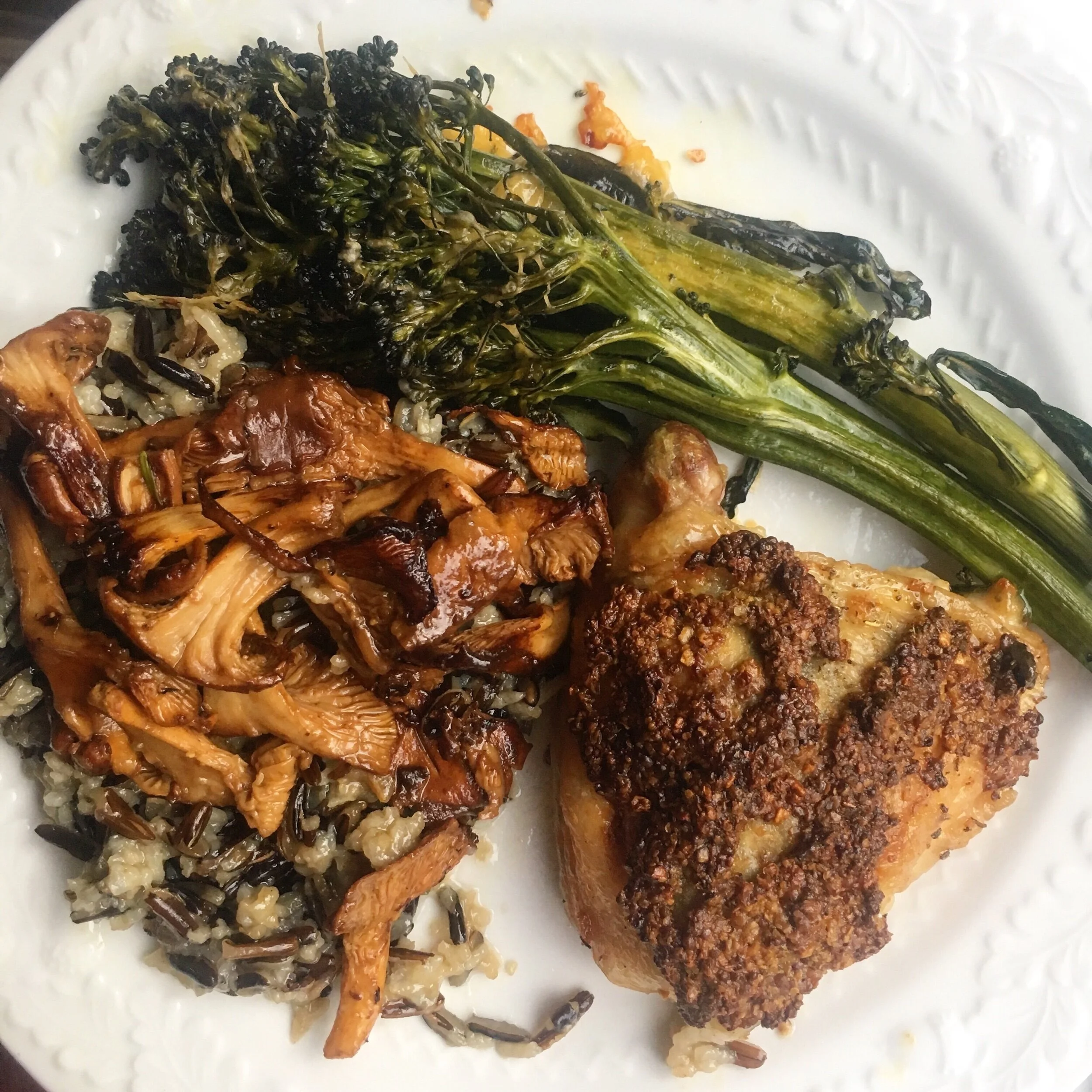 Tonight’s dinner of cheesy broccolini, wild rice with chanterelles, and mustard chicken thighs